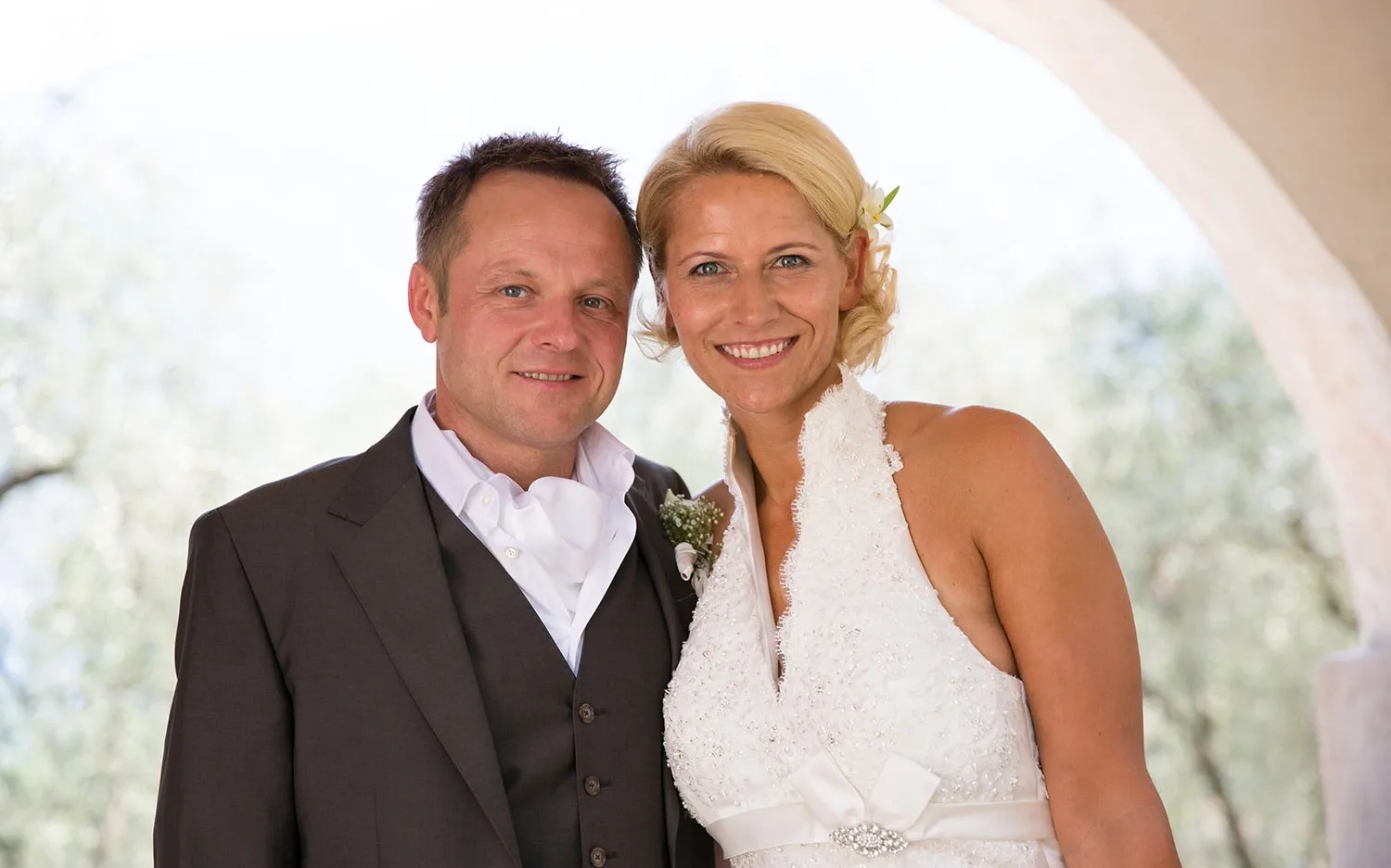 Smiling bride and groom on their wedding day